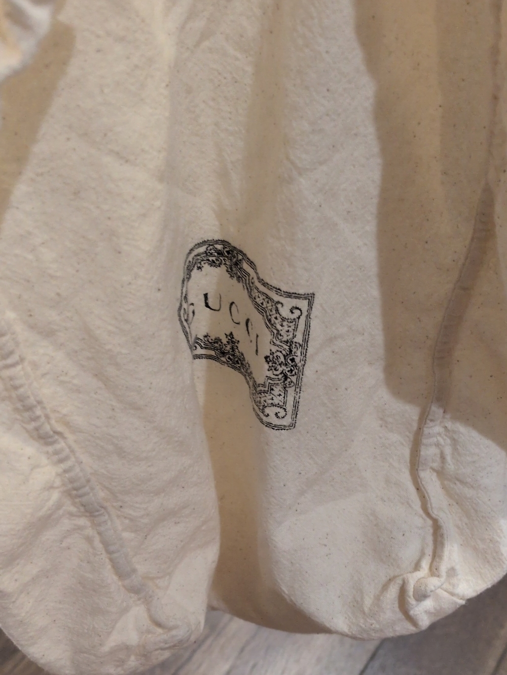 Gucci Cream Short Sleeve Tee with Black Logo Graphic